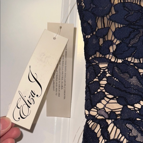 Elegant Navy Lace Dress with Polka Dot Mesh - Picture 3 of 7